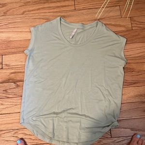 Very pale green shirt good condition.